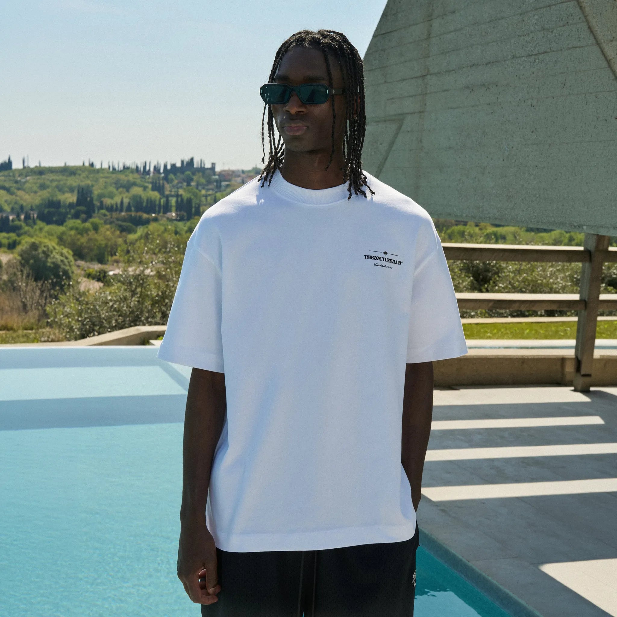 Front View of The Couture Club Copyright Multi Graphic White T-Shirt